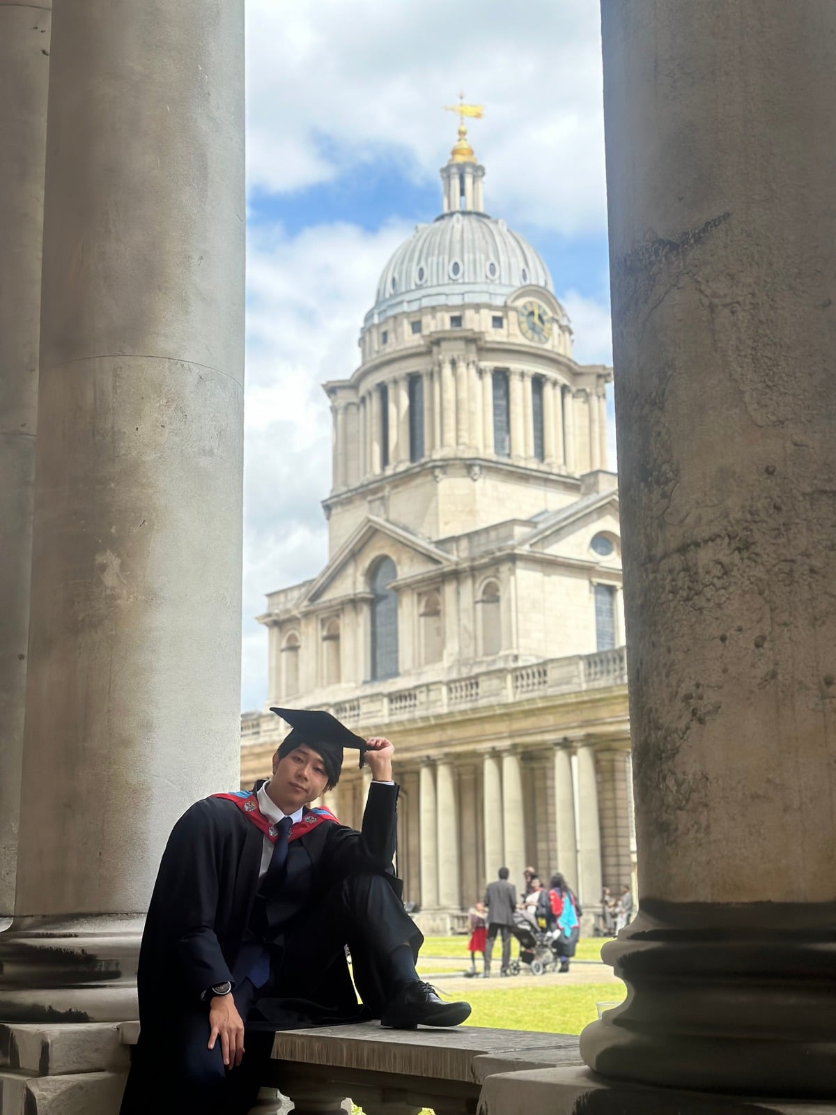 Ryota in graduation gown at the Old Royal Naval College, Greenwich